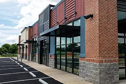 Commercial business building with integrated security systems